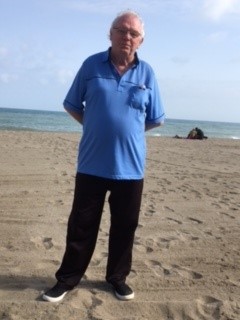 Gordon Darnell pictured stood on a beach